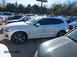 2018 Volvo XC60 Momentum with VIN YV4A22RK8J1004594, listed as a IAAI auction lot 41194134 with 82,771 mi miles and . Bid and sale history available at DreamBid. Image 14.