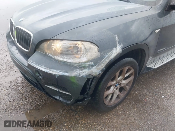 2011 BMW X5 35i z VIN 5UXZV4C59BL404339, wystawiony jako IAAI lot #42167977 z przebiegiem 109 378 mil mil oraz . Historia ofert i sprzedaży dostępna na DreamBid. Obrazek 6.