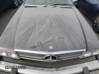 1984 Mercedes-Benz 380 SL z VIN WDBBA45A5EA009369, wystawiony jako Copart lot #74363674 z przebiegiem 79 513 mil mil oraz Szkoda całkowita • Salvage title. Historia ofert i sprzedaży dostępna na DreamBid. Obrazek 11.