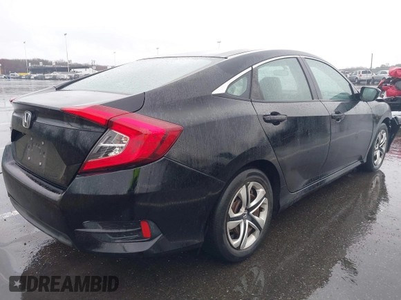2018 Honda Civic LX with VIN 2HGFC2F54JH548274, listed as a IAAI auction lot 41864457 with 60,905 mi miles and . Bid and sale history available at DreamBid. Image 4.