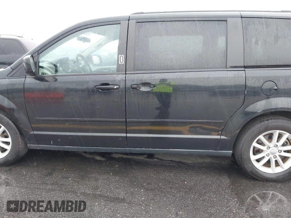2015 Dodge Grand Caravan SXT with VIN 2C4RDGCG8FR556861, listed as a IAAI auction lot 42224948 with 110,797 mi miles and . Bid and sale history available at DreamBid. Image 15.