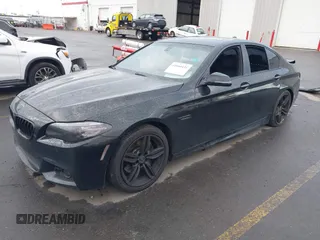 2015 BMW 5 Series 535i with VIN WBA5B1C51FG125924, listed as a IAAI auction lot 41060431 with 102,957 mi miles and . Bid and sale history available at carsss.com. Image 17.
