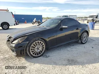 2006 Mercedes-Benz SLK-Class 5.5L AMG with VIN WDBWK73F06F100763, listed as a Copart auction lot 86308114 with 147,759 mi miles and Salvage Title. Bid and sale history available at carsss.com. Image 1.