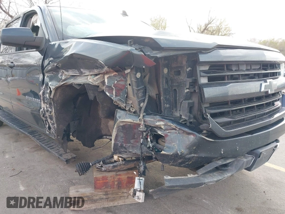 2017 Chevrolet Silverado 1500 LT with VIN 3GCUKREC7HG220780, listed as a IAAI auction lot 41978463 with 131,532 mi miles and . Bid and sale history available at DreamBid. Image 6.