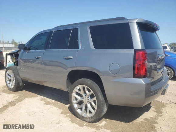 2020 Chevrolet Tahoe LT with VIN 1GNSCBKCXLR239646, listed as a Copart auction lot 48225035 with 128,229 mi miles and Non Repairable. Bid and sale history available at carsss.com. Image 2.