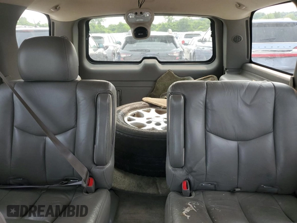 2004 Chevrolet Tahoe Z71 z VIN 1GNEK13ZX4R159262, wystawiony jako Copart lot #58047455 z przebiegiem Nie podano mil oraz Szkoda całkowita • Salvage title. Historia ofert i sprzedaży dostępna na DreamBid. Obrazek 10.