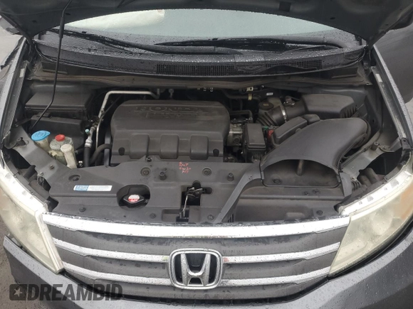 2011 Honda Odyssey EX-L with VIN 5FNRL5H64BB050425, listed as a Copart auction lot 49101795 with 192,238 mi miles and Salvage Title. Bid and sale history available at DreamBid. Image 12.