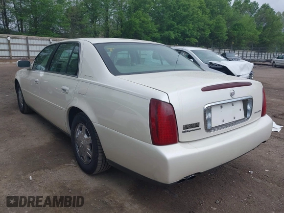 2003 Cadillac DeVille with VIN 1G6KD54Y93U179035, listed as a IAAI auction lot 42114653 with 112,591 mi miles. Bid and sale history available at carsss.com. Image 3.