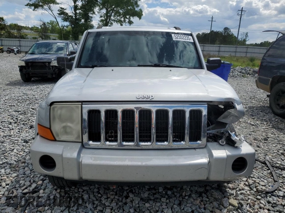 2009 Jeep Commander Sport with VIN 1J8HH48K89C540189, listed as a Copart auction lot 52552235 with 258,377 mi miles and Salvage title. Bid and sale history available at DreamBid. Image 5.
