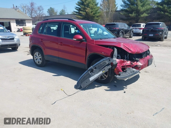 2015 Volkswagen Tiguan SE z VIN WVGBV7AX7FW056002, wystawiony jako IAAI lot #42122641 z przebiegiem 77 037 mil mil oraz . Historia ofert i sprzedaży dostępna na DreamBid. Obrazek 1.