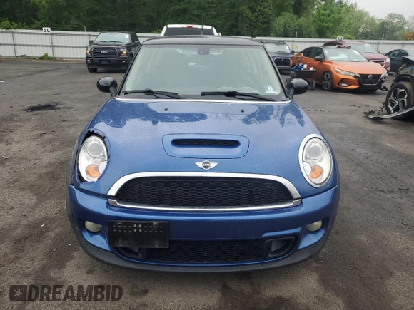 2013 MINI Hardtop S with VIN WMWSV3C55DT387777, listed as a Copart auction lot 56495215 with 53,033 mi miles and Salvage title. Bid and sale history available at DreamBid. Image 5.
