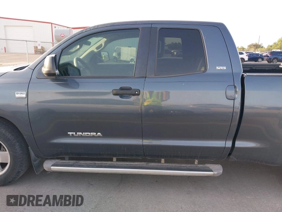 2007 Toyota Tundra SR5 with VIN 5TFRT54117X006566, listed as a IAAI auction lot 42074633 with 277,024 mi miles and . Bid and sale history available at DreamBid. Image 14.