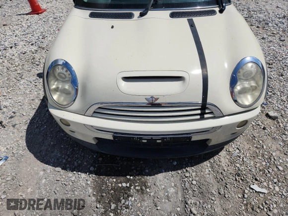 2006 MINI Hardtop S with VIN WMWRE33556TJ38543, listed as a Copart auction lot 62420145 with 105,656 mi miles and Salvage title. Bid and sale history available at DreamBid. Image 11.