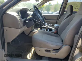 2003 Jeep Grand Cherokee Laredo with VIN 1J4GW48S23C524693, listed as a Copart auction lot 64461755 with 243,936 mi miles and Salvage title. Bid and sale history available at DreamBid. Image 7.