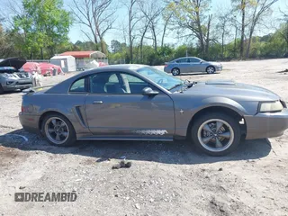2003 Ford Mustang Standard z VIN 1FAFP40463F327753, wystawiony jako IAAI lot #42005257 z przebiegiem 325 449 mil mil oraz . Historia ofert i sprzedaży dostępna na DreamBid. Obrazek 14.