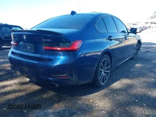 2019 BMW 3 Series 330i xDrive with VIN WBA5R7C59KAJ83727, listed as a IAAI auction lot 42244312 with 69,680 mi miles and . Bid and sale history available at DreamBid. Image 4.