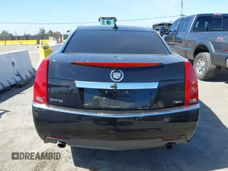 2012 Cadillac CTS Performance z VIN 1G6DJ5E30C0156576, wystawiony jako IAAI lot #42287858 z przebiegiem 106 497 mil mil oraz . Historia ofert i sprzedaży dostępna na DreamBid. Obrazek 17.