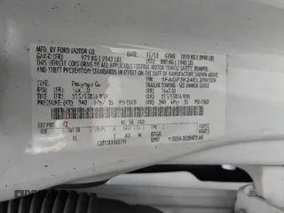 2014 Ford Focus SE with VIN 1FADP3K24EL209329, listed as a IAAI auction lot 42223749 with 141,196 mi miles and . Bid and sale history available at carsss.com. Image 9.