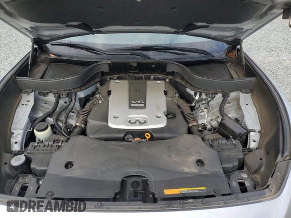 2017 Infiniti QX70 z VIN JN8CS1MW4HM413947, wystawiony jako Copart lot #44513185 z przebiegiem 75 049 mil mil oraz Szkoda całkowita • Salvage title. Historia ofert i sprzedaży dostępna na DreamBid. Obrazek 13.