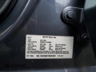 2022 Tesla Model Y Performance with VIN 7SAYGDEF1NF491967, listed as a Copart auction lot 51119515 with 50,520 mi miles and Salvage title. Bid and sale history available at DreamBid. Image 14.