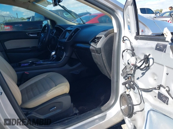 2016 Ford Edge SEL with VIN 2FMPK3J81GBC31668, listed as a IAAI auction lot 40769410 with 125,549 mi miles. Bid and sale history available at carsss.com. Image 5.