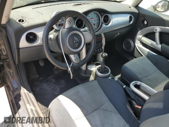 2006 MINI Hardtop with VIN WMWRC33516TK73752, listed as a Copart auction lot 62053245 with 126,836 mi miles and Clean title. Bid and sale history available at DreamBid. Image 8.