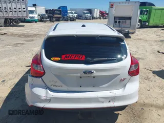 2014 Ford Focus ST with VIN 1FADP3L99EL311771, listed as a IAAI auction lot 41419521 with 124,572 mi miles and . Bid and sale history available at carsss.com. Image 17.