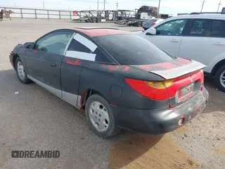 2002 Saturn SC with VIN 1G8ZR12782Z247790, listed as a IAAI auction lot 41813543 with Not Provided miles and . Bid and sale history available at DreamBid. Image 3.