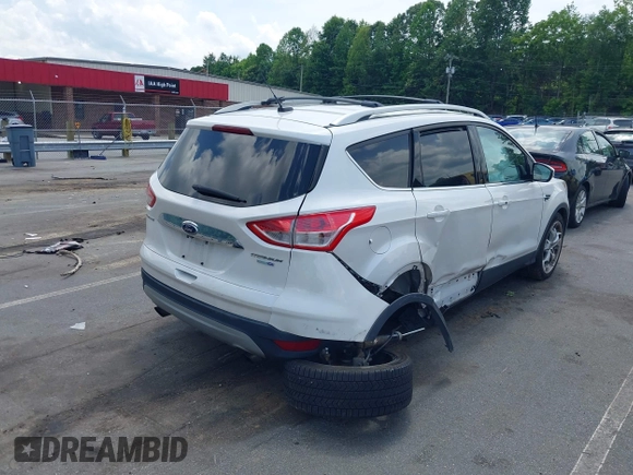 2016 Ford Escape Titanium with VIN 1FMCU9J90GUC48346, listed as a IAAI auction lot 42523307 with 114,265 mi miles and . Bid and sale history available at DreamBid. Image 4.