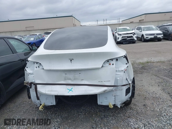 2023 Tesla Model Y Long Range z VIN 7SAYGDEE9PF623285, wystawiony jako IAAI lot #41383184 z przebiegiem 34 092 mil mil oraz . Historia ofert i sprzedaży dostępna na DreamBid. Obrazek 16.