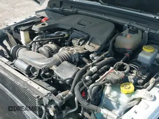 2020 Jeep Wrangler Sport S with VIN 1C4GJXAG3LW275413, listed as a IAAI auction lot 41884921 with 63,727 mi miles and . Bid and sale history available at DreamBid. Image 19.