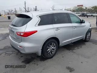 2014 Infiniti QX60 with VIN 5N1AL0MM7EC500070, listed as a IAAI auction lot 42544763 with 189,419 mi miles and . Bid and sale history available at DreamBid. Image 4.