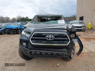2017 Toyota Tacoma SR5 z VIN 3TMAZ5CN7HM043144, wystawiony jako IAAI lot #41758561 z przebiegiem 205 213 mil mil oraz . Historia ofert i sprzedaży dostępna na DreamBid. Obrazek 12.