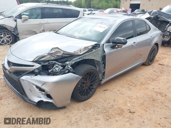 2023 Toyota Camry SE with VIN 4T1T11AK1PU736752, listed as a IAAI auction lot 41986290 with 38,636 mi miles and . Bid and sale history available at DreamBid. Image 18.