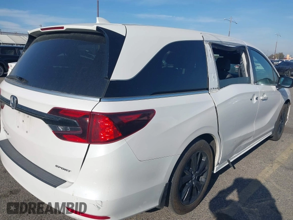 2023 Honda Odyssey Sport z VIN 5FNRL6H77PB011088, wystawiony jako IAAI lot #41883596 z przebiegiem 80 528 mil mil oraz . Historia ofert i sprzedaży dostępna na DreamBid. Obrazek 6.