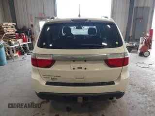 2012 Dodge Durango SXT with VIN 1C4RDJAGXCC295138, listed as a IAAI auction lot 42333094 with 96,581 mi miles and . Bid and sale history available at DreamBid. Image 16.