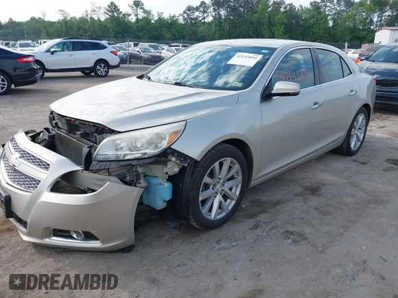 2013 Chevrolet Malibu LTZ with VIN 1G11H5SA5DF259174, listed as a IAAI auction lot 42145891 with 158,959 mi miles and . Bid and sale history available at DreamBid. Image 2.