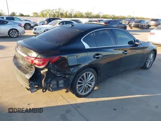 2018 Infiniti Q50 3.0t LUXE with VIN JN1EV7AP7JM363310, listed as a IAAI auction lot 40924400 with 103,578 mi miles. Bid and sale history available at carsss.com. Image 4.