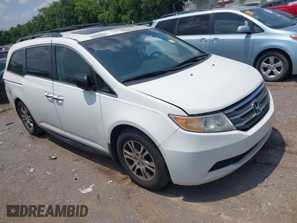 2012 Honda Odyssey EX-L with VIN 5FNRL5H63CB063684, listed as a IAAI auction lot 42576742 with 170,656 mi miles and . Bid and sale history available at DreamBid. Image 13.