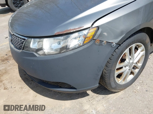 2011 Kia Forte EX with VIN KNAFU4A22B5405396, listed as a IAAI auction lot 42125381 with 209,300 mi miles. Bid and sale history available at carsss.com. Image 6.