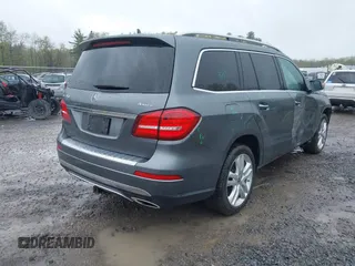 2018 Mercedes-Benz GLS 450 z VIN 4JGDF6EE5JB106257, wystawiony jako IAAI lot #42187413 z przebiegiem 104 217 mil mil oraz . Historia ofert i sprzedaży dostępna na DreamBid. Obrazek 4.