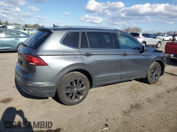 2023 Volkswagen Tiguan SE with VIN 3VVMB7AX9PM018778, listed as a Copart auction lot 50565555 with 9,758 mi miles and Salvage Title. Bid and sale history available at DreamBid. Image 3.
