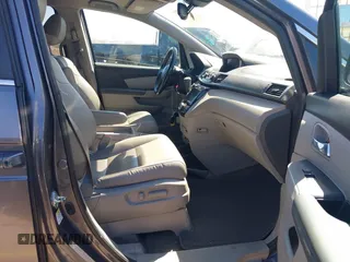 2015 Honda Odyssey EX-L with VIN 5FNRL5H66FB063215, listed as a IAAI auction lot 41846532 with 153,048 mi miles and . Bid and sale history available at carsss.com. Image 5.