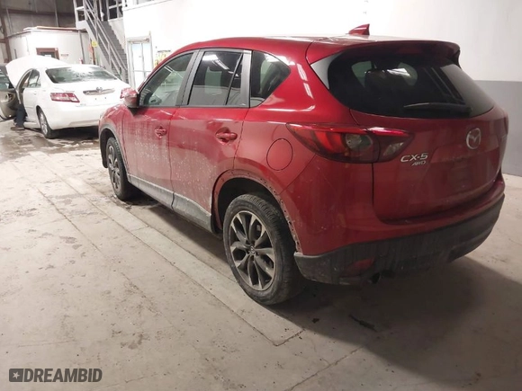 2016 Mazda CX-5 Grand Touring with VIN JM3KE4DY8G0622347, listed as a IAAI auction lot 41618997 with NaN miles. Bid and sale history available at carsss.com. Image 3.