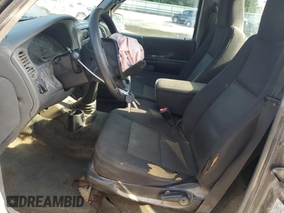 2004 Ford Ranger XL with VIN 1FTYR10D54PA23272, listed as a Copart auction lot 61907895 with 227,114 mi miles and Salvage title. Bid and sale history available at DreamBid. Image 7.