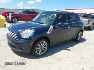 2012 MINI Countryman with VIN WMWZB3C5XCWM06084, listed as a IAAI auction lot 42744454 with 177,231 mi miles and . Bid and sale history available at DreamBid. Image 2.