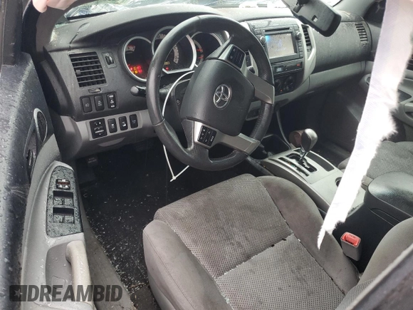 2013 Toyota Tacoma with VIN 5TFLU4EN8DX065656, listed as a Copart auction lot 63486165 with 185,018 mi miles and Salvage title. Bid and sale history available at DreamBid. Image 8.