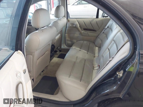 1997 Cadillac Catera z VIN W06VR54R9VR162389, wystawiony jako IAAI lot #40142990 z przebiegiem 111 558 mil mil oraz . Historia ofert i sprzedaży dostępna na DreamBid. Obrazek 8.