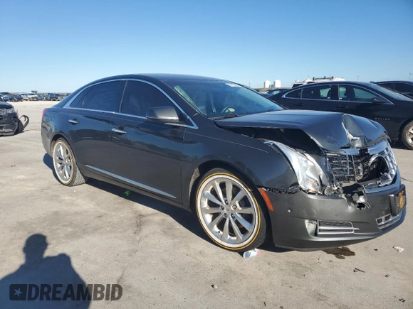 2014 Cadillac XTS Luxury with VIN 2G61M5S32E9291663, listed as a Copart auction lot 50421035 with 34,051 mi miles and Salvage title. Bid and sale history available at DreamBid. Image 4.