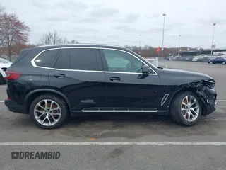 2023 BMW X5 xDrive40i with VIN 5UXCR6C0XP9P90557, listed as a IAAI auction lot 41860825 with 49,737 mi miles. Bid and sale history available at carsss.com. Image 13.